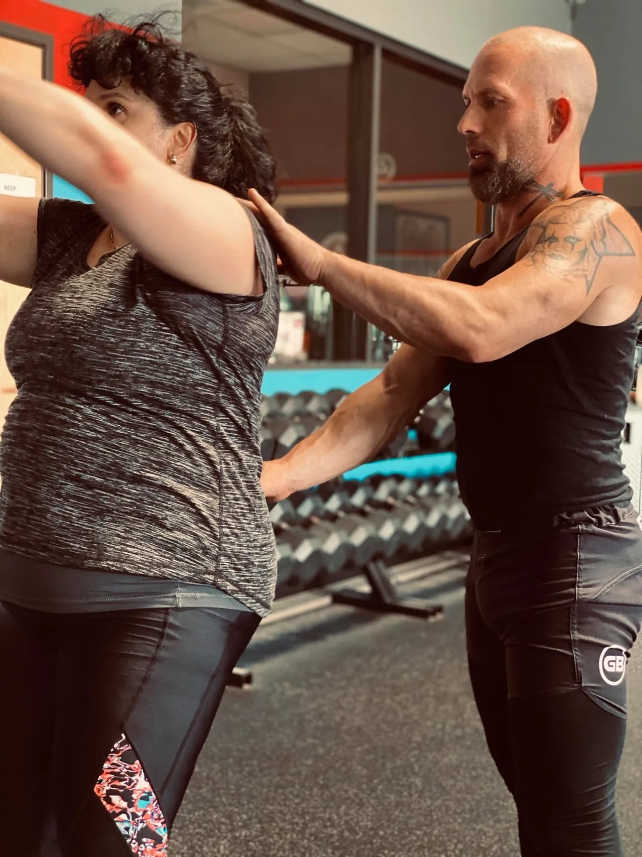 Woman training with fitness coach